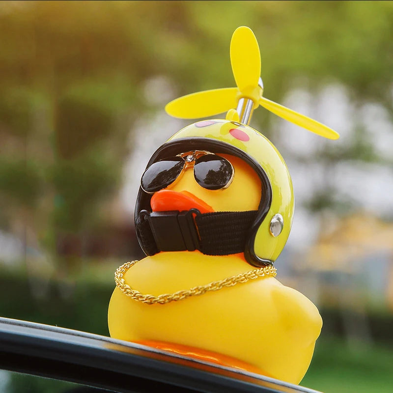 CowLost | product_id-car-dashboard-duck-ornament-with-helmet-cycling-toy-accessory |9