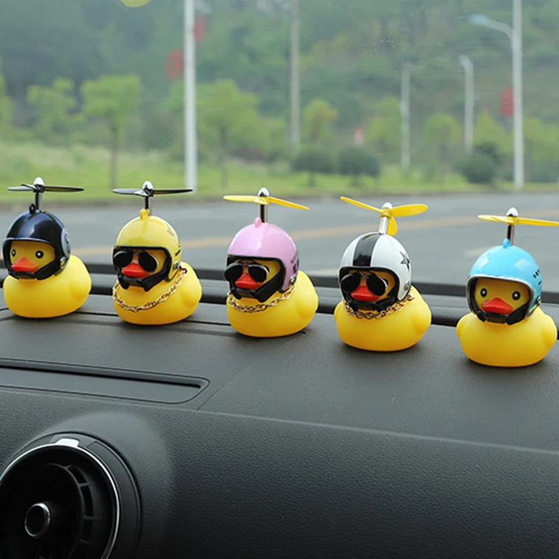 CowLost | product_id-car-dashboard-duck-ornament-with-helmet-cycling-toy-accessory |8