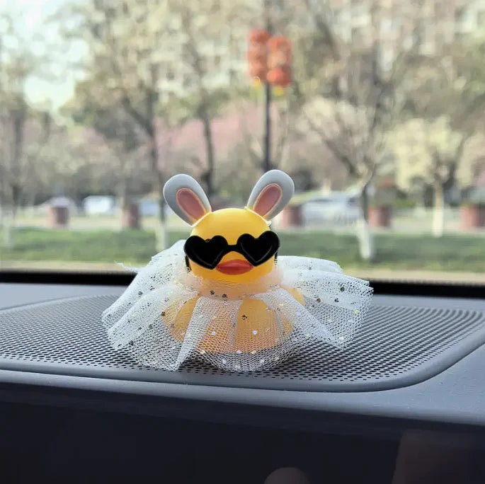 CowLost | product_id-car-rubber-duck-dashboard-decoration-with-sun-hat-and-swim-ring-necklace |10