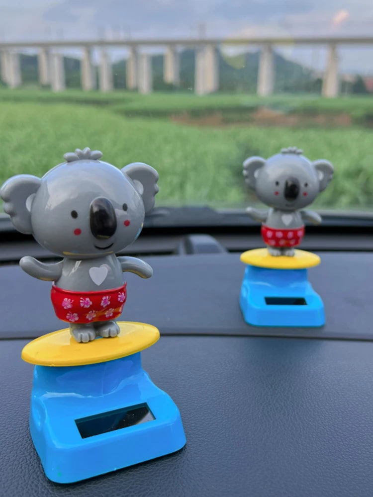 CowLost | cartoon-car-ornament-animal-kala-design-with-nodding-head-a-fun-decorative-piece-for-your-car-and-home |3