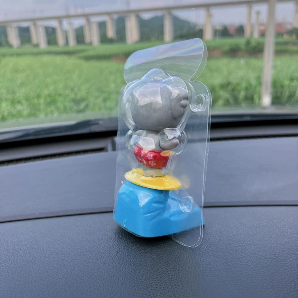 CowLost | cartoon-car-ornament-animal-kala-design-with-nodding-head-a-fun-decorative-piece-for-your-car-and-home |7