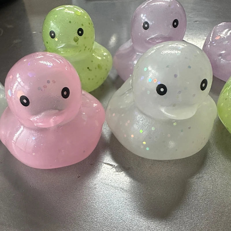 CowLost | product_id-10-100-pcs-colorful-squeaky-rubber-ducks-for-party-favors-prizes-and-car-decor |3