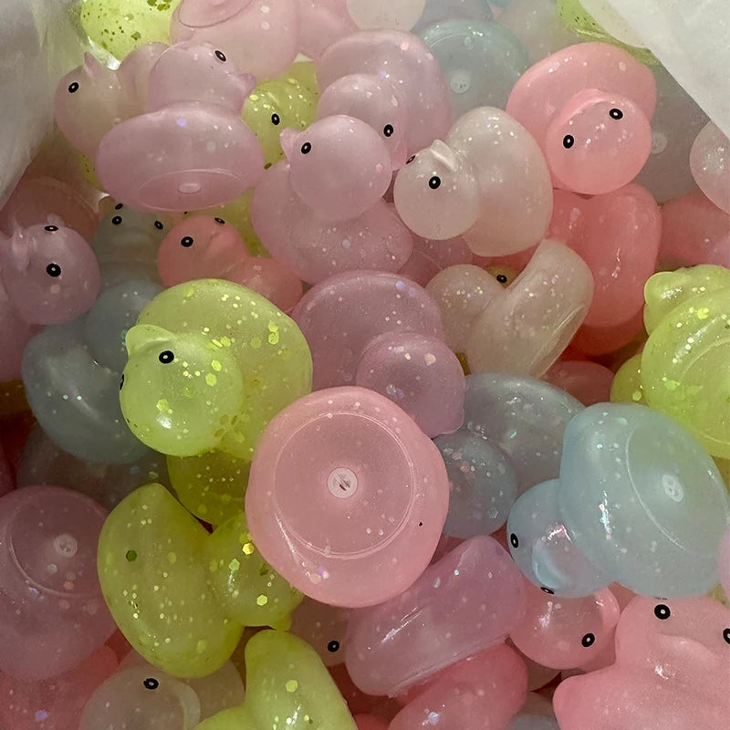 CowLost | product_id-10-100-pcs-colorful-squeaky-rubber-ducks-for-party-favors-prizes-and-car-decor |4