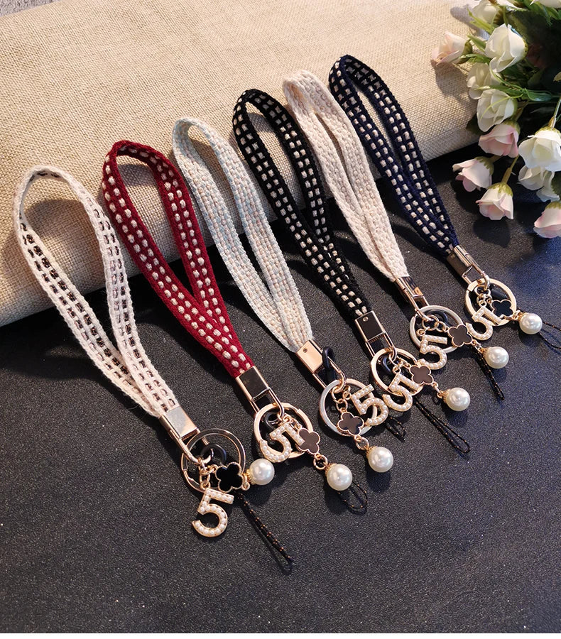 CowLost | activewear-pants-womens-short-phone-lanyard-with-woven-pearl-pendant-bracelet |16