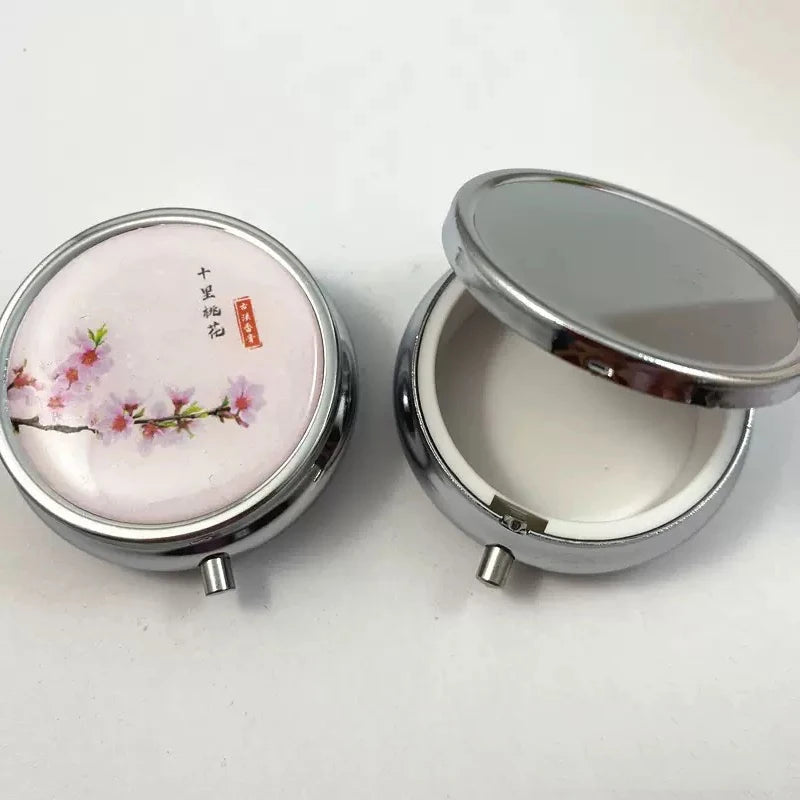 CowLost | product_id-portable-metal-round-medicine-storage-box-dispenser-with-natural-pattern-for-travel-and-camping |2