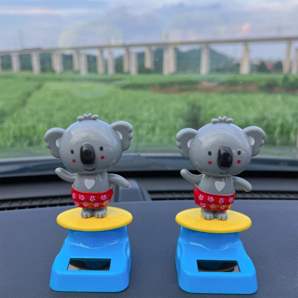 CowLost | cartoon-car-ornament-animal-kala-design-with-nodding-head-a-fun-decorative-piece-for-your-car-and-home |2