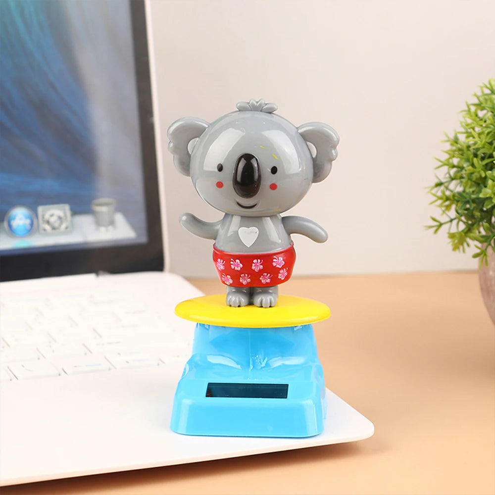 CowLost | cartoon-car-ornament-animal-kala-design-with-nodding-head-a-fun-decorative-piece-for-your-car-and-home |6