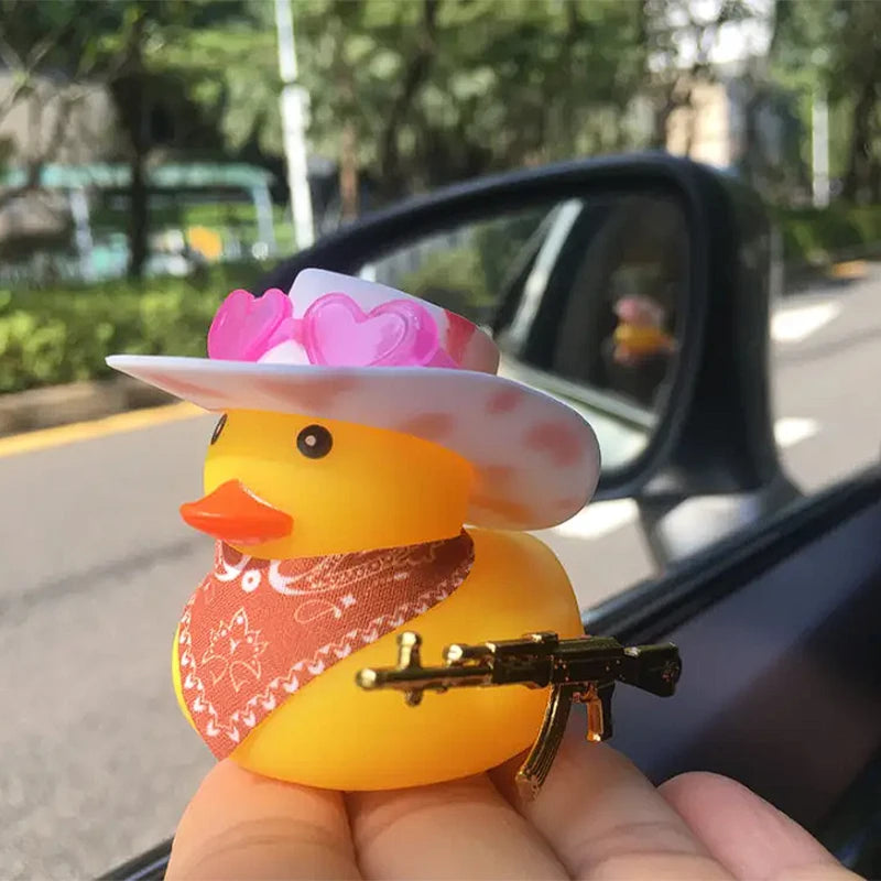 CowLost | product_id-cowboy-duck-with-guns-car-dashboard-decoration-rubber-duck-ornament-with-mini-swim-ring-sun-hat-and-sunglasses |16