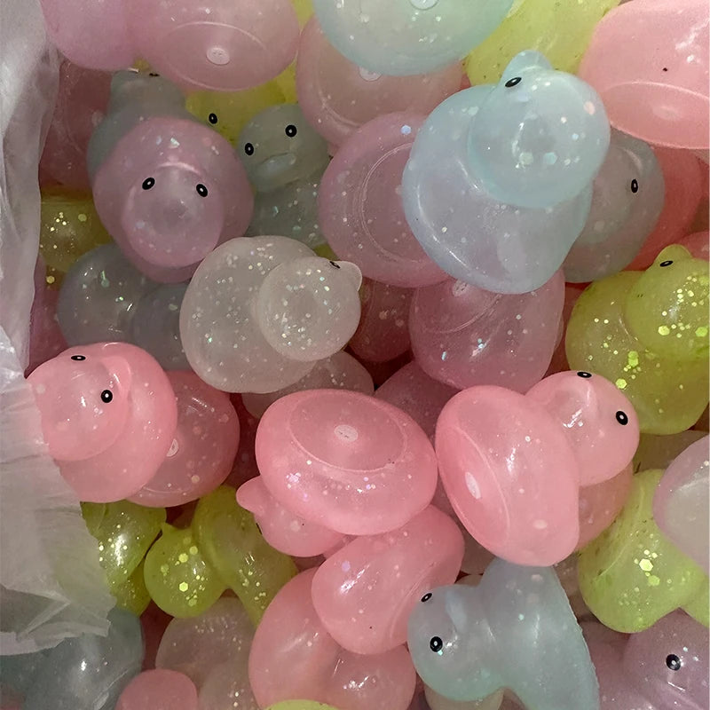 CowLost | product_id-10-100-pcs-colorful-squeaky-rubber-ducks-for-party-favors-prizes-and-car-decor |5