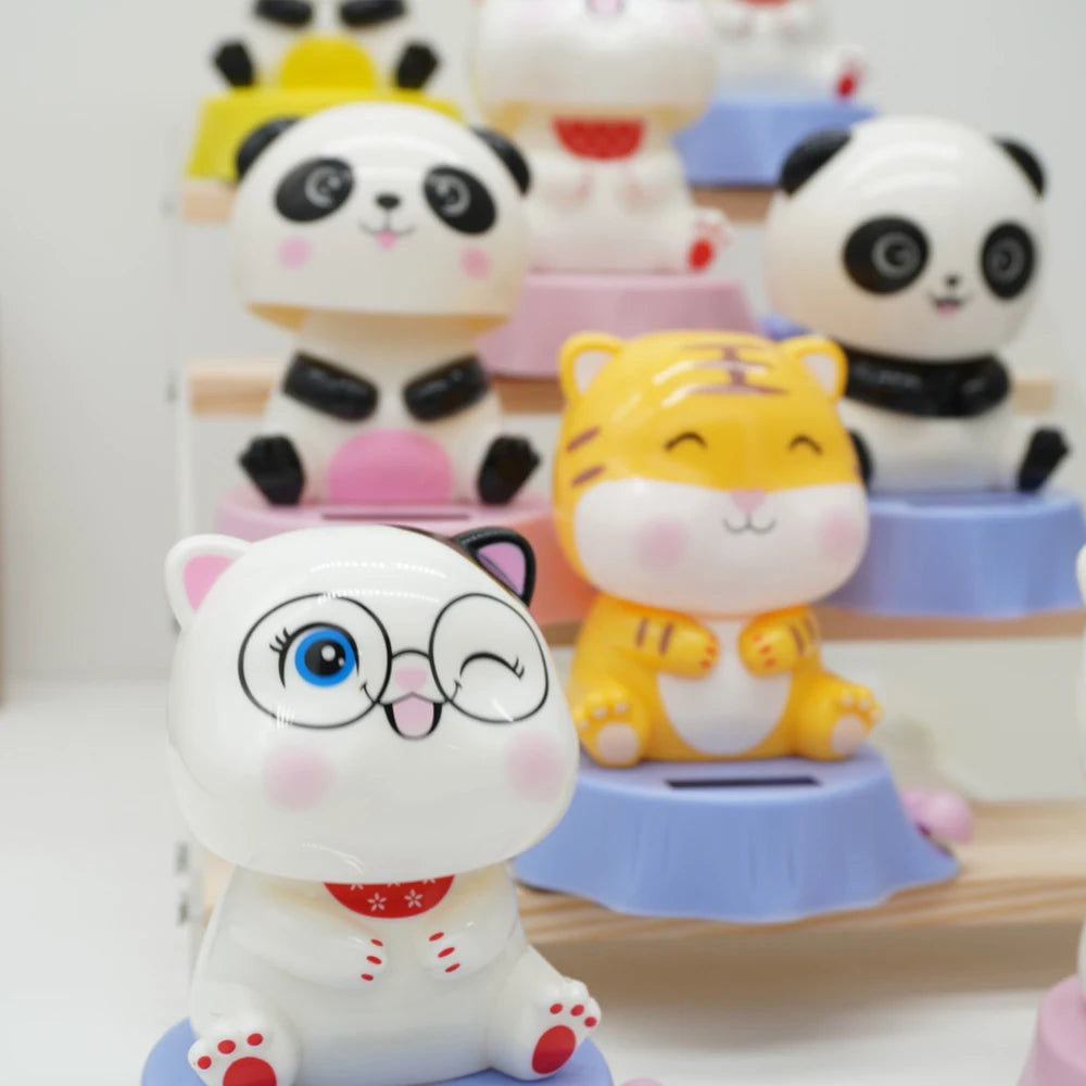 CowLost | product_id-8-solar-powered-cartoon-animal-bobblehead-car-decorations-panda-cat-shapes-gift-set |4
