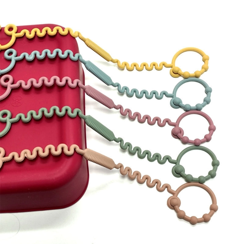CowLost | versatile-teething-toy-bottle-holder-silicone-strap-practical-reliable-teether |8
