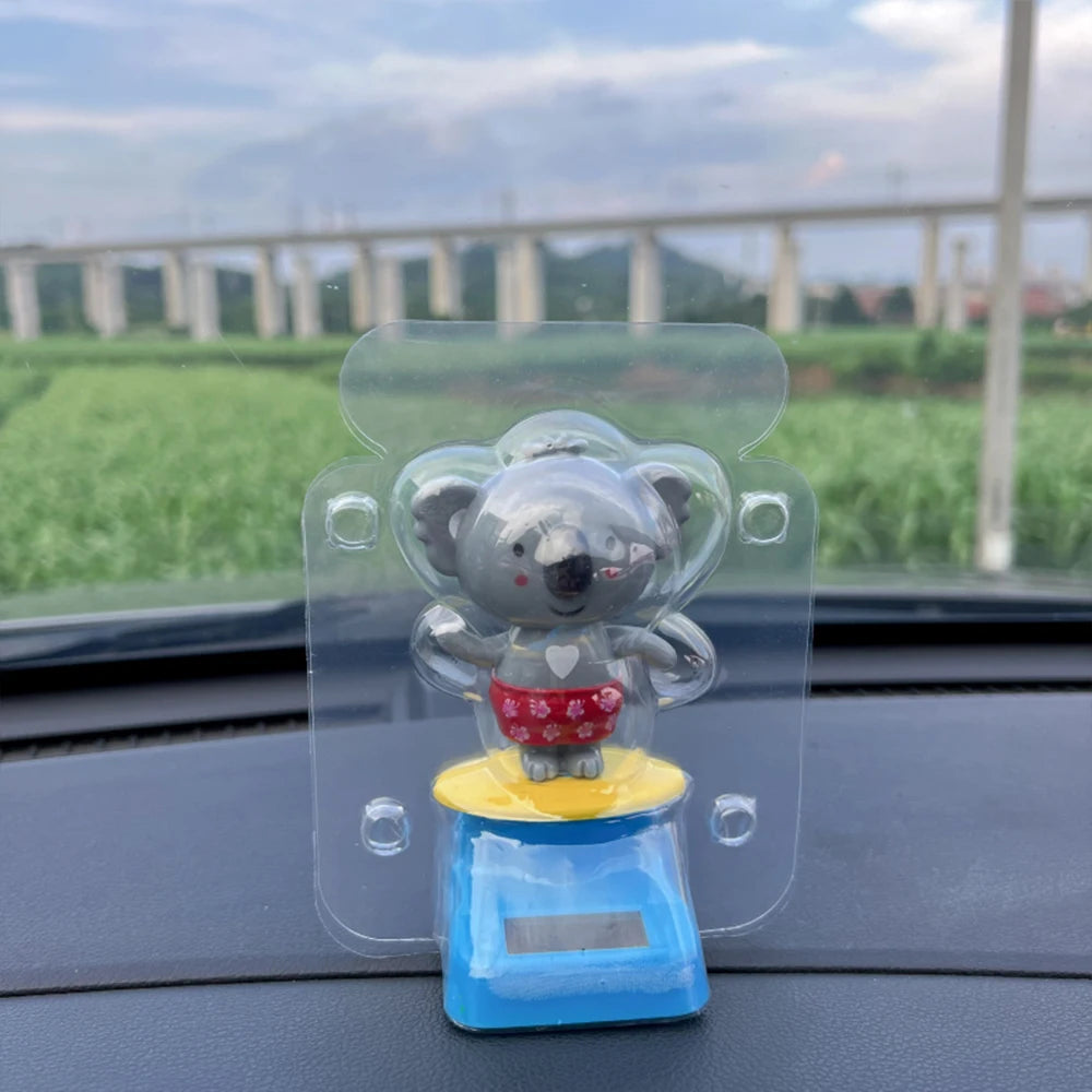 CowLost | cartoon-car-ornament-animal-kala-design-with-nodding-head-a-fun-decorative-piece-for-your-car-and-home |8