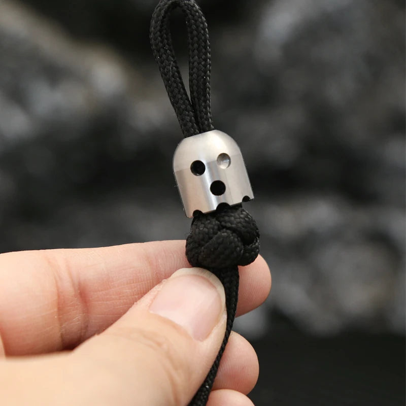 CowLost | product_id-ghost-shaped-stainless-steel-pendant-with-paracord-rope-stress-reliever-edc-toy |3