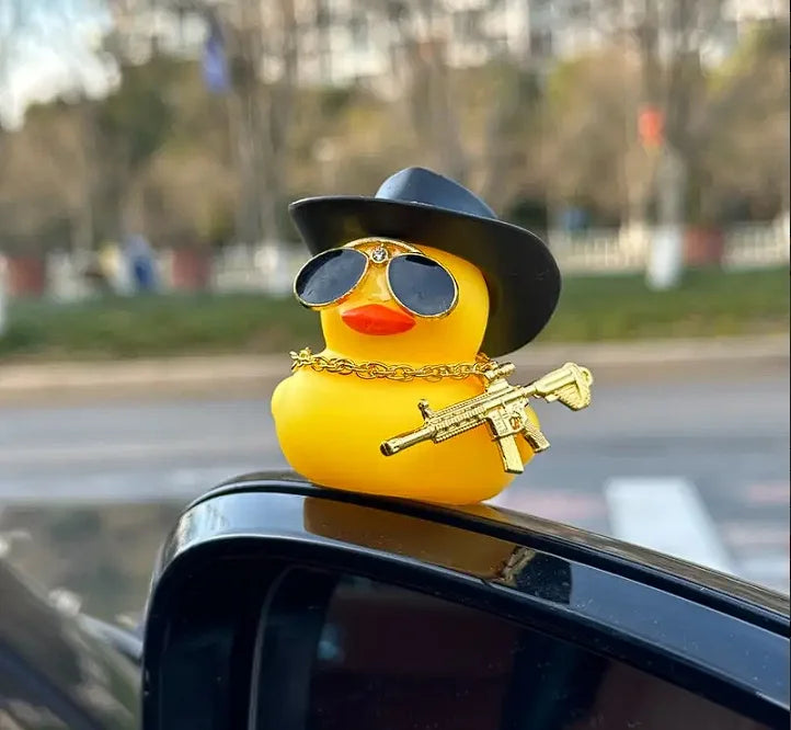 CowLost | product_id-cowboy-duck-with-guns-car-dashboard-decoration-rubber-duck-ornament-with-mini-swim-ring-sun-hat-and-sunglasses |8