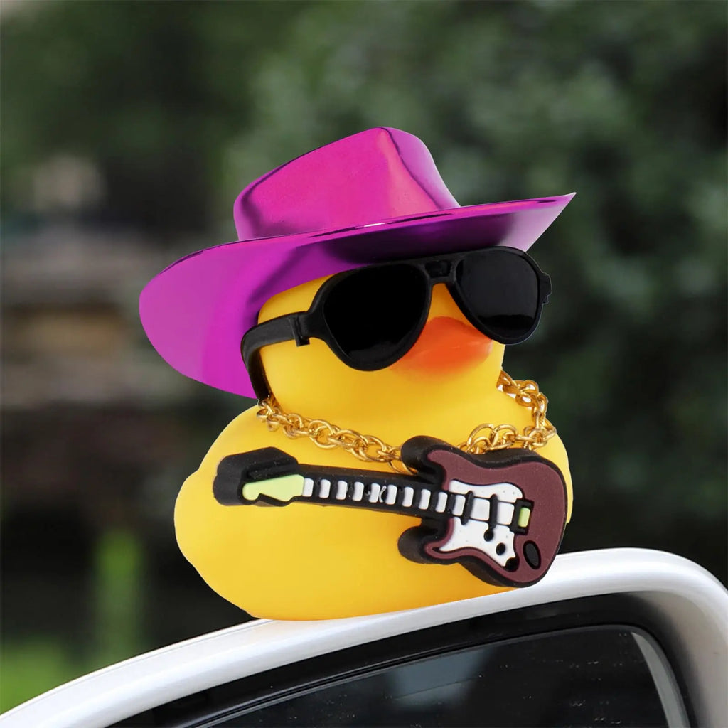 CowLost | product_id-purple-rubber-duck-car-ornament-with-cowboy-hat-necklace-and-sunglasses-dashboard-decoration |5