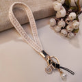 CowLost | activewear-pants-womens-short-phone-lanyard-with-woven-pearl-pendant-bracelet |23