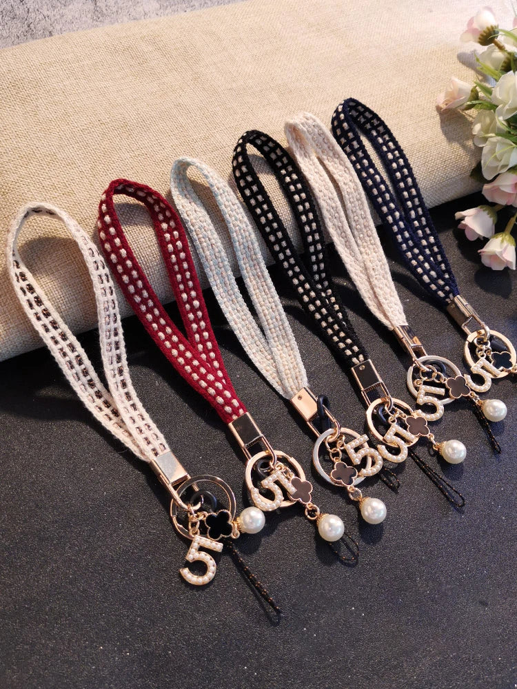 CowLost | activewear-pants-womens-short-phone-lanyard-with-woven-pearl-pendant-bracelet |3