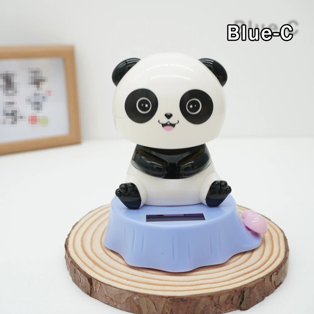 CowLost | product_id-8-solar-powered-cartoon-animal-bobblehead-car-decorations-panda-cat-shapes-gift-set |9