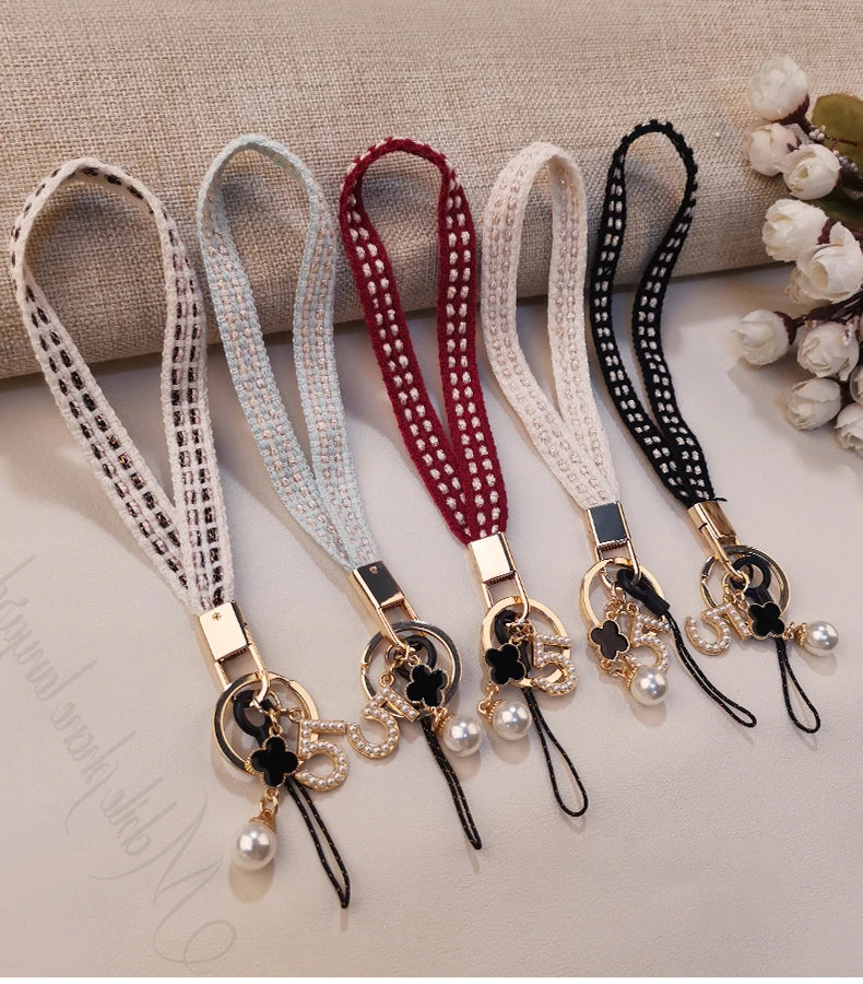 CowLost | activewear-pants-womens-short-phone-lanyard-with-woven-pearl-pendant-bracelet |9