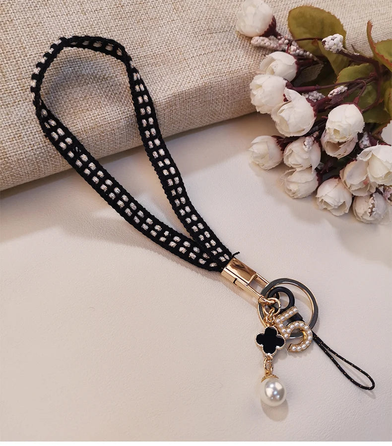 CowLost | activewear-pants-womens-short-phone-lanyard-with-woven-pearl-pendant-bracelet |21