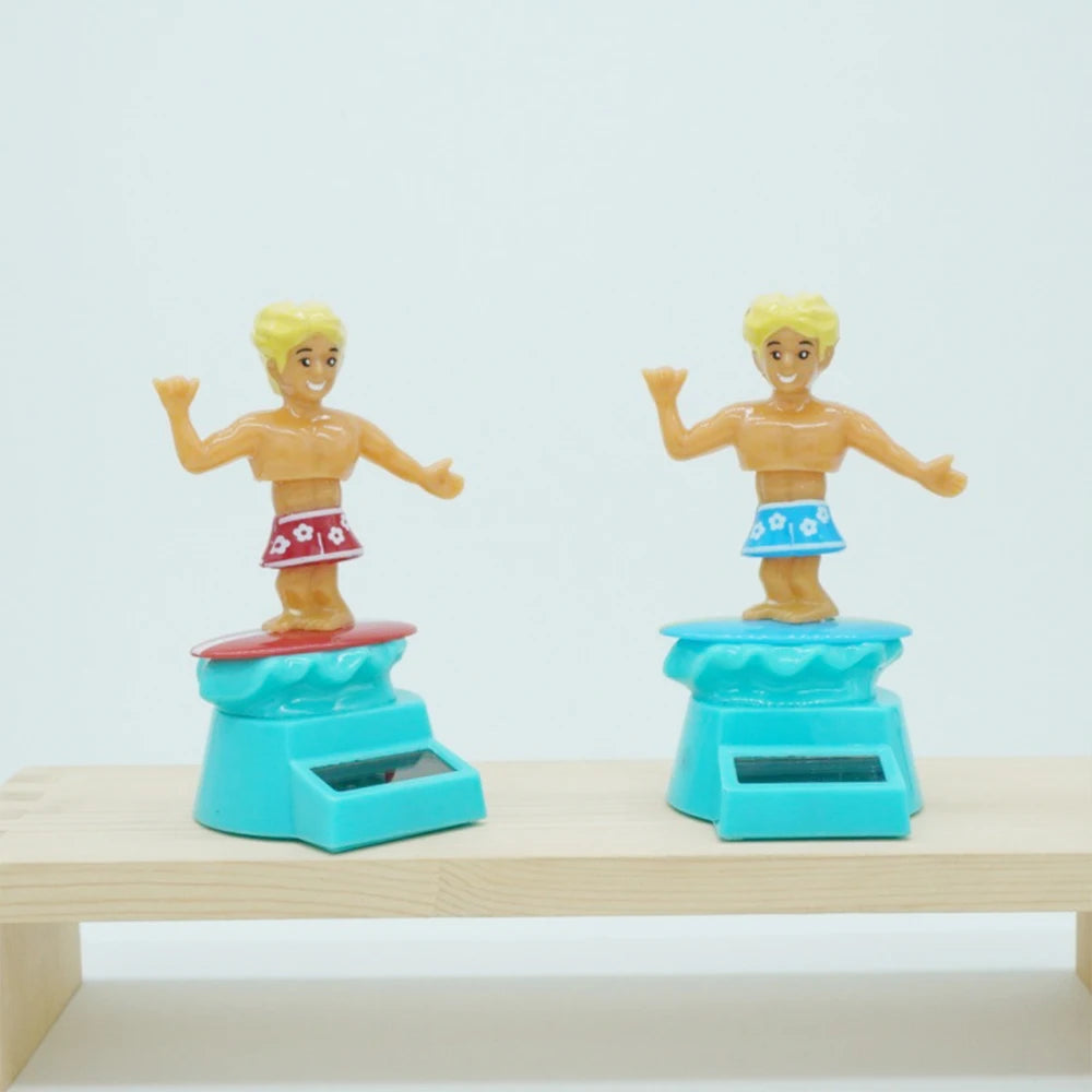 CowLost | product_id-surfing-boy-bobblehead-car-dashboard-decor-with-motion-effect-cartoon-beach-lover-gift |4