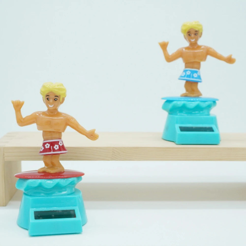 CowLost | product_id-surfing-boy-bobblehead-car-dashboard-decor-with-motion-effect-cartoon-beach-lover-gift |1